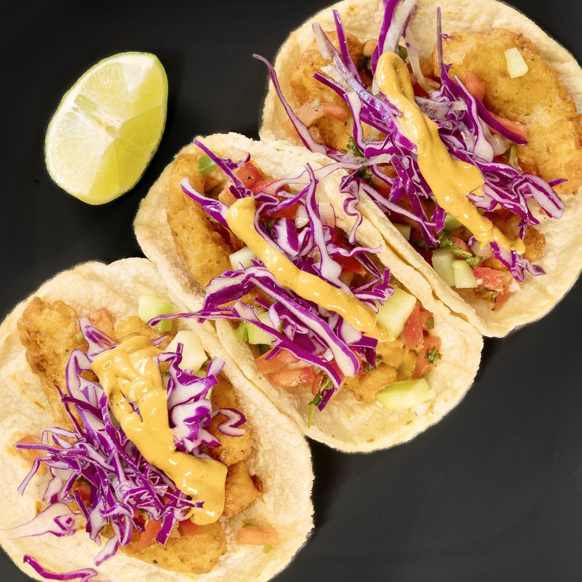 Fish tacos with cabbage, pico, and crema — Birria Patro San Jose